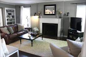 15 Cozy Living Rooms With Fireplaces Page 2 Of 3 Grey Walls Living Room Living Room Decor Gray Brown Couch Living Room