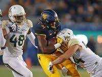Gritty Mountaineers Hold Off Baylor In Two Overtimes West Virginia University Athletics West Virginia University Football And Basketball West Virginia