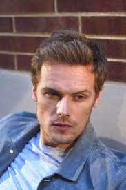 Sam looks so gorgeous and happy