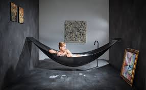 We hire and sell hot tub hammocks. A Hammock Shaped Carbon Fibre Bathtub By Splinter Works