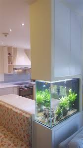 It is also an important decorative element that may add a kitchen class and style. Kitchen With Family Area Attached Aquarium And More Contemporary Kitchen Other By Redecor Me Houzz