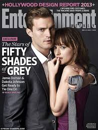 Steamy Jamie Dornan 31 Stares Moodily Into The Camera As Billionaire Christian Grey Clutching 24 Y Shades Of Grey Movie Shades Of Grey Fifty Shades Of Grey