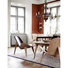 The shell chair is a deeply dynamic piece that inspires both style and a sense of adventure into modern living and lounge areas. Ch07 Shell Chair By Hans Wegner Carl Hansen Son Palette Parlor Modern Design