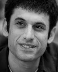 Merlin: A Language for Managing Network Resources