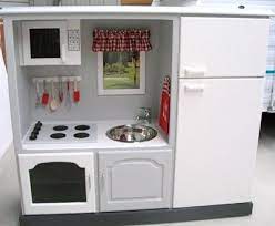 Peek's total expense was $266. Entertainment Center Turned Play Kitchen Kids Play Kitchen Diy Play Kitchen Play Kitchen
