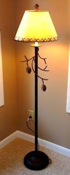 Made from resin, this pinecone floor lamp brings a rustic element into your home. Rustic Cabin Bedroom Lighting At Cabin 9 Design Rustic Floor Lamps Cone Floor Lamp Metal Floor Lamps