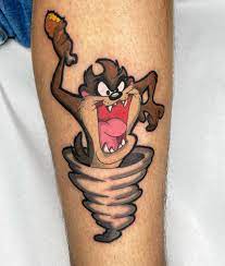 Red and black tasmanian devil tattoo on leg. 101 Amazing Looney Tunes Tattoo Ideas That Will Blow Your Mind Outsons Men S Fashion Tips And Style Guide For 2020 In 2021 Cartoon Tattoos Bunny Tattoos Tattoos