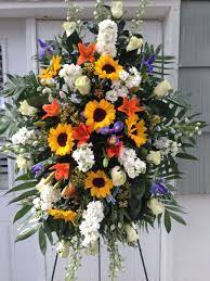 See more ideas about flower arrangements, beautiful flower arrangements, floral arrangements. Standing Spray Yellow Orange White Blue In Lake Hiawatha Nj Landmark Florist
