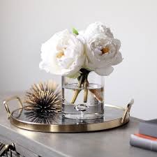 On any given day, your dining room table is covered with bills or that online order you keep forgetting to return. White Real Touch Peony Floral Arrangement In Clear Glass Vase Dining Room Table Centerpieces Coffe Table Decor Table Centerpieces For Home