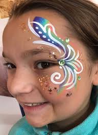 Face painter thanks clients for business