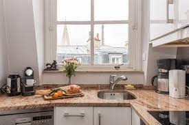 Rent Our 1 Bedroom Apartment Quincy A Charming And Oh So Parisian Left Bank Apartment With Beautiful Vie Small Apartment Paris Paris Kitchen Parisian Kitchen