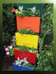 The very best file cabinet to convert to a planter is one with a metal bottom; 26 File Cabinet Uses Upcycle Ideas Filing Cabinet File Cabinet Planter Planters