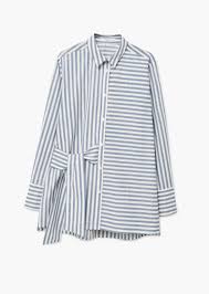 Dengan desain sederhana membuat busana ini lebih terlihat santai dibandingkan dengan model baju kemeja lainnya.untuk kemeja sendiri sebenarnya memiliki kesan yang formal sehingga cocok digunakan untuk acara formal. Kemeja Wanita Desain Blus Kemeja Wanita Pakaian