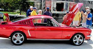 I almost bought this car. Candy Apple Red 65 Mustang Fastback At Disney Car Show Mustang Truck 65 Mustang Fastback Mustang Fastback