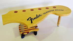 The real fender ones are about $200, but i found i can get a knockoff from yorkville up here for $90, and i can also buy a fender medallion to put on it. Furniture Coulsons Joinery