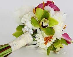 This gorgeous, cascading hawaiian orchid wedding bouquet is made to order for your special day. Tropical Orchid With Shells Bridal Bouquet Tropical Wedding Bouquets Wedding Flowers Bridal Bouquets Tropical Bridal Bouquet