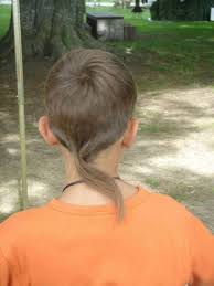 The Rat Tail Not To Be Confused With The Hare Krishna The Rat Tail Is A Ponytail At The Base Of The Head While Rat Tail Haircut Tail Hairstyle Hair Styles