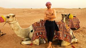 Overview of camel riding tour in dubai. Zac Efron Rides A Camel Shirtless In Dubai See The Smoldering Pics Entertainment Tonight