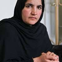 U.S. Navy Lt. Cmdr. Joel McMillan poses in front of