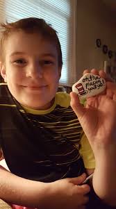 I left my little girl's stroller at the bottom of the stairs going up the  Holy family school if anybody finds it please