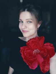 Brautkleid ansteckblume rose