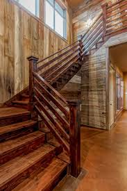 Rustic Stairs With Natural Wood Walls And Stained Wood Steps Handrails Rustic Staircase Rustic Stairs Stair Railing Design