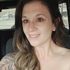 Female tattoo artist specializing in realism and fine lines