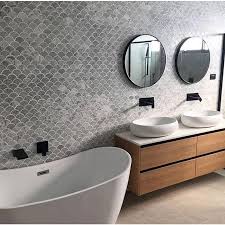 Black Bathroom Vanity With Timber Top White Round Freestanding Bathtub With Overflow Matte Black Wall Bath Spout And Wall Mixer Set On Grey Tile Bathroom Bathroom Tile Designs Mosaic Bathroom Tile