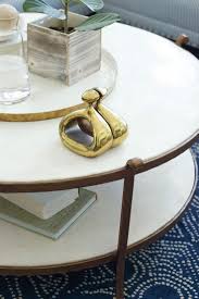 Recalling The Furnishings Of 1940s Paris Our Table Is Elegantly Fashioned From Gilt Iron And Stone The Dua Stone Coffee Table Coffee Table Round Coffee Table
