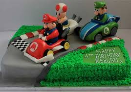 The classic cupcakes are vanilla with vanilla buttercream the toadstools have vanilla cupcake faces, and their tops are chocolate mousse with brownie discs inside. 12 Creative Go Kart Birthday Cake Ideas Gokartguide