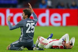He has four younger sisters: Thomas Muller Was Given A Red Card For A Wild Flying Kick Watch Here