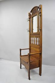 Maybe you would like to learn more about one of these? Antique Eastlake Victorian Golden Tiger Oak Hall Coat Tree With Storage Bench At 1stdibs