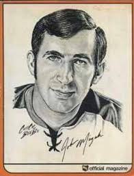 Portland's Gerry Goyer (27) and Bill Saunders (7) are making life tough