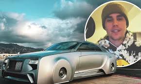 Justin bieber's white ferrari was parked after a traffic stop and the photographer was hit as he walked across the boulevard after taking pictures. Justin Bieber Has 330k Rolls Royce Wraith Transformed To Futuristic Look Featuring Concealed Wheels Daily Mail Online