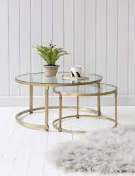 The most common glass coffee table material is glass. Round Glass Coffee Tables Home For You Gold Nesting Table Nesting Round Coffee Ta Nesting Coffee Table Cof Interer Magazina Interer Dizajn Interera Dlya Doma