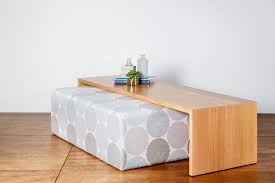 A round ottoman is a good choice for a sectional since it provides ready access to everyone to share. Waterfall Coffee Table And Ottoman