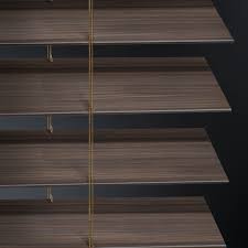 When lowering your blind lift up on the bottomrail first then release the tension on the cord lock. Custom Faux Wood Blinds Veneta Window Fashions