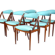 The good news is that when their chairs begin to chip or crack, or if the fabric is stained or faded, you do not have to pull the chairs out. Danish Modern Kai Kristiansen Chairs From Stonesoupology On Etsy