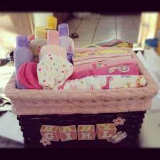 What To Put In Baby Shower Gift Bags For Guests 27 Awesome Ideas Baby Shower Baskets Baby Shower Gift Basket Diy Baby Shower Gifts