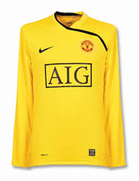 It had a blue lining down the side and a blue and red v neck. Manchester United 2008 09 Gk Away Kit