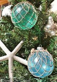 Easy diy seashell christmas ornaments. Glass Float Ornaments Sand And Sisal Coastal Christmas Decor Beach Christmas Mermaid Christmas