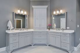 In this refined bathroom created by designyyz, the small marble tile inserted within a large slate tile floor lengthens the space and provides a nice focal point. Rob Michelle S Master Bathroom Remodel Pictures Luxury Home Remodeling Sebring Design Build