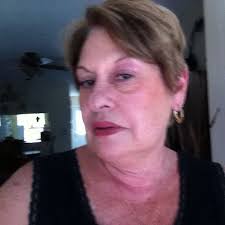 If you play with five people, what does your fifth person do while she is  sitting out? I feel like it is rude to sit by a particular player and have a