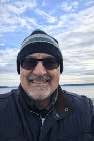 Can I charge my electric vehicle inside my garage with a 240 charger and  how does it affect insurance?