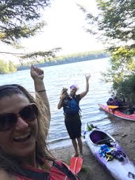 Portaging a kayak to Scorch Lake
