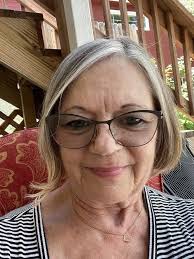 What are some haircut and styling suggestions for a 73-year-old woman with  thin hair?