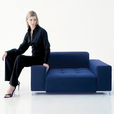 Zanotta monobloc sofa, entirely covered with full grain blue leather, resting on four black lacquered metal legs. Sofa Series Alfa By Zanotta