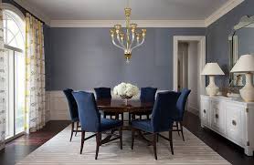 You can use blue and white linen for your dining chairs or glassware of pale blue hue corresponding to the furnishing for a dramatic appeal. Blue Velvet French Dining Chairs At Antique Round Dining Table Traditional Dining Room