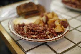 Push one edge of the corned beef in a bit to give space to add water to the pan. Hash Food Wikipedia
