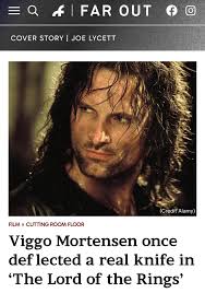 It was ment to be thrown somewhere close to Viggo but not directly towards  him. the actor playing the orc had vision troubles with his mask, and  accidentally threw the knife directly